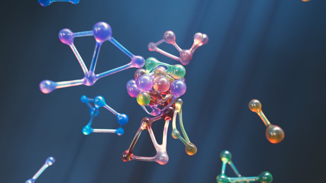 Product Colorful abstract representation of molecular structures with 3D spheres and connections.